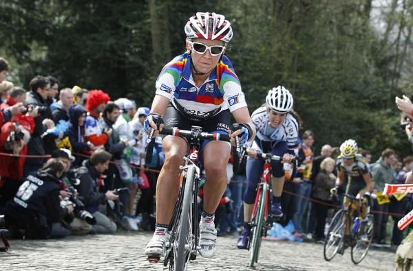 World Cup leader Emma Pooley (Garmin-Cervelo) pushes the pace on the cobbles