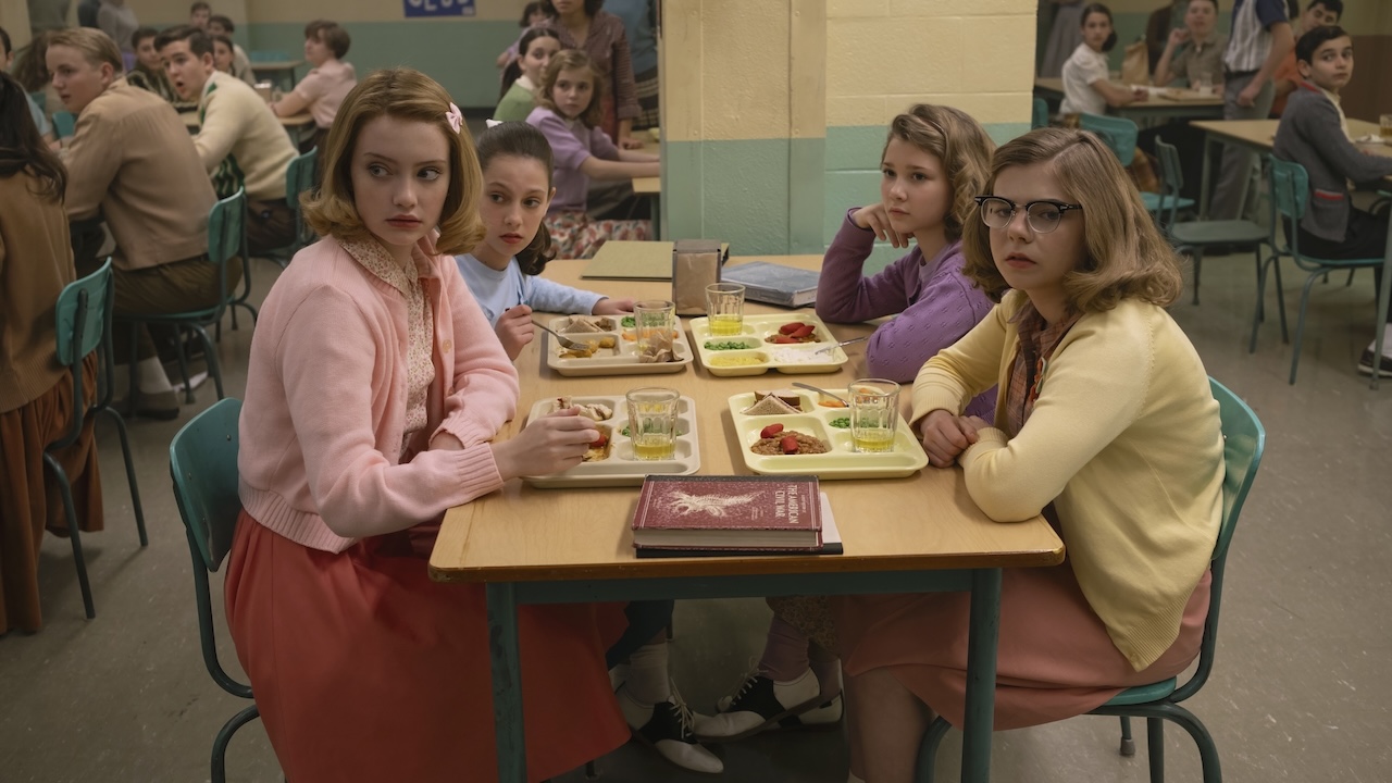 Marge and Pattycakes sitting at lunch table in IT: Welcome to Derry Season 1