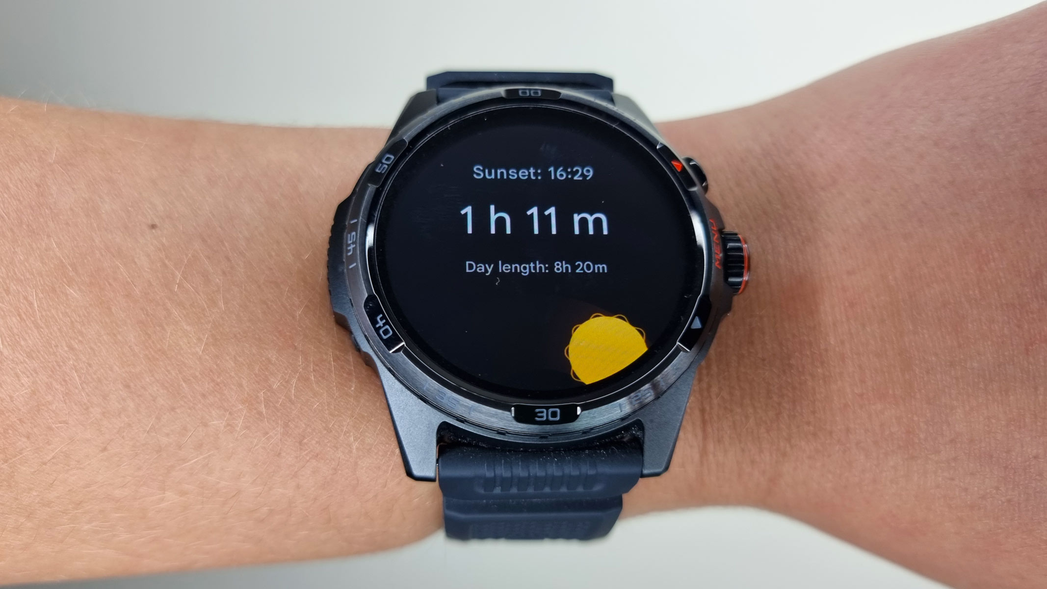 TicWatch Atlas smartwatch, a close-up picture of the sunset screen