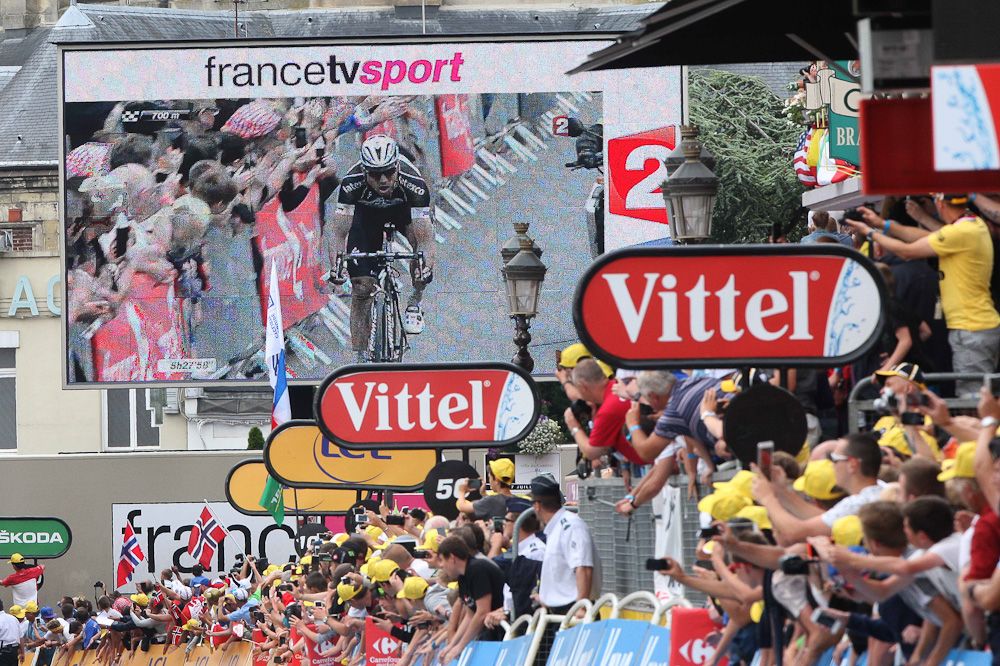 Tony Martin on the big screen at the finish.