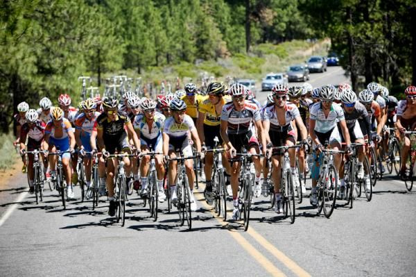 The main bunch hits the bottom of the last climb.
