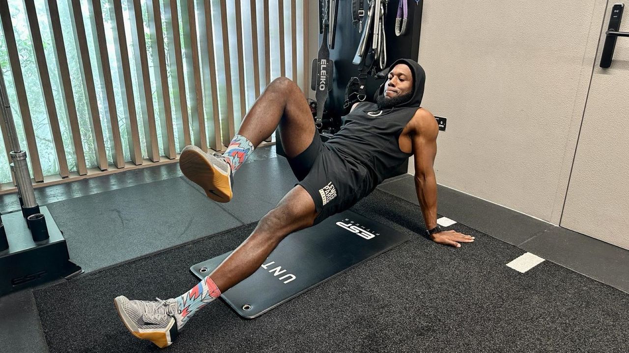 Lewis Paris performs reverse plank marches