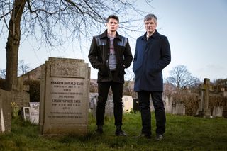 Emmerdale Caleb and Nicky beside Frank Tate's grave