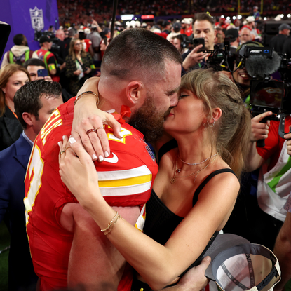 Travis Kelce #87 of the Kansas City Chiefs and Taylor Swift embrace after defeating the San Francisco 49ers in overtime during Super Bowl LVIII at Allegiant Stadium on February 11, 2024 in Las Vegas, Nevada.