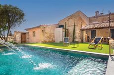 The outdoor pool at boutique hotel Palacio Condes de Cirac in Villalba