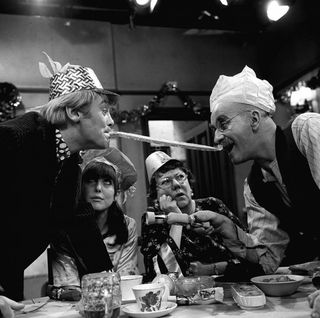 Warren Mitchell as Alf Garnet (right) in the comedy series 'Til Death Do Us Part with Anthony Booth as son in law Mike, Una Stubbs as daughter Rita and Dandy Nichols as Else during the recording of an episode of the show. (PA Wire)