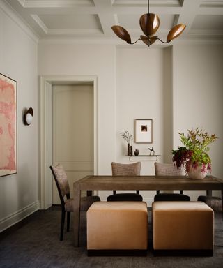 alcove in dining room with art