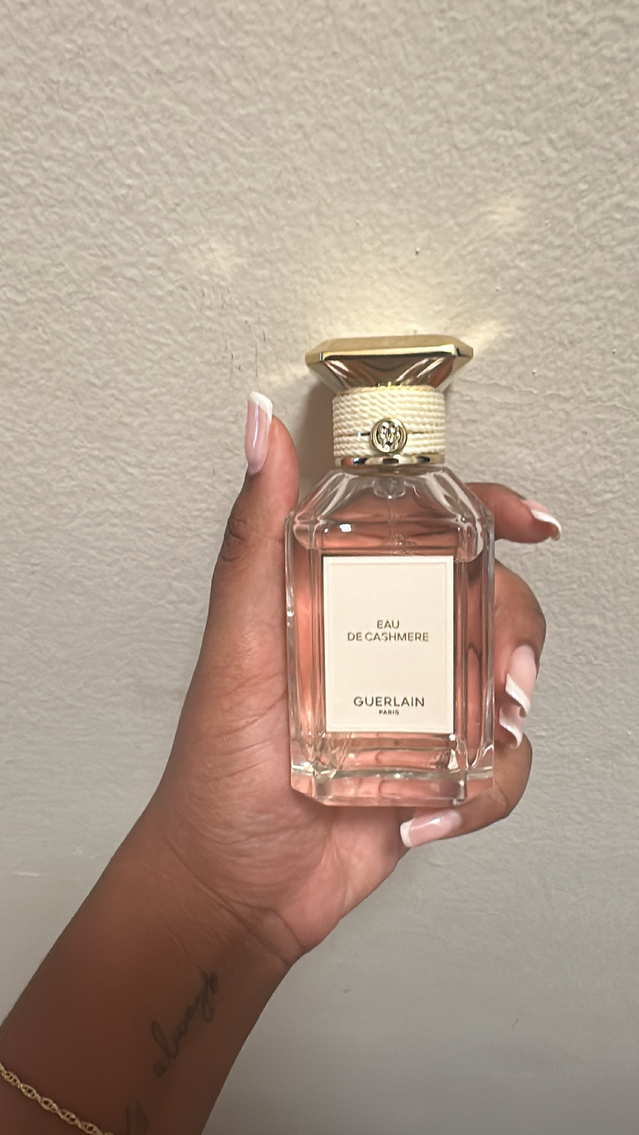 Ariel Baker testing Guerlain Eau de Cashmere