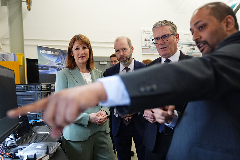 Rachel Reeves and Keir Starmer being shown around a factory