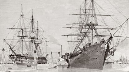 HMS Agamemnon (L) and USS Niagara (R) taking aboard cable
