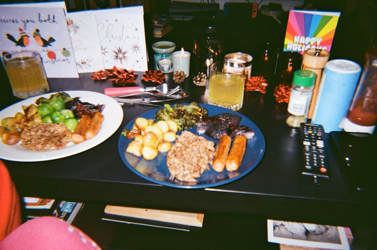 A photo of a plate of food taken on a Novocolor Swiss+Go 35mm film camera