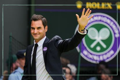 Roger Federer waves to the crowds at Wimbledon in a suit