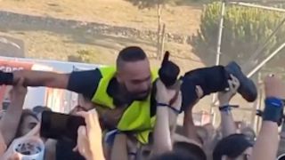 Crowd surfing security guard