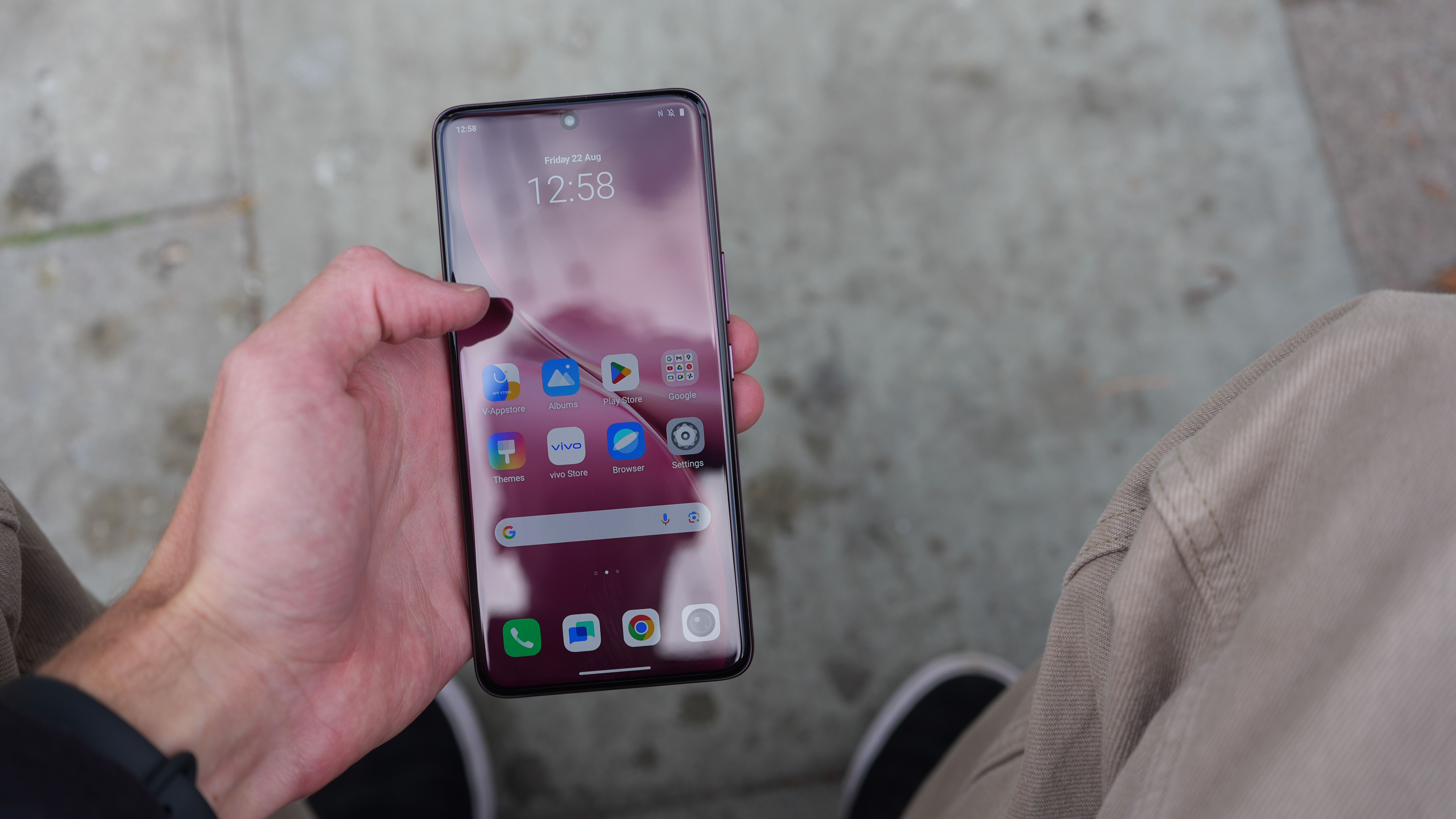Vivo V60 phone held in a hand