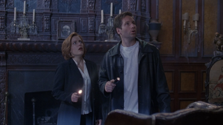 Gillian Anderson and David Duchovny in The X-Files "How The Ghosts Stole Christmas"