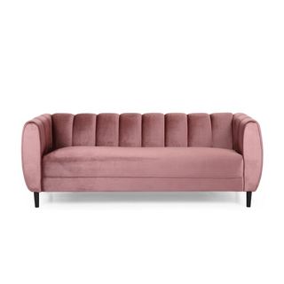 A pink velvet tufted couch from Everly Quinn