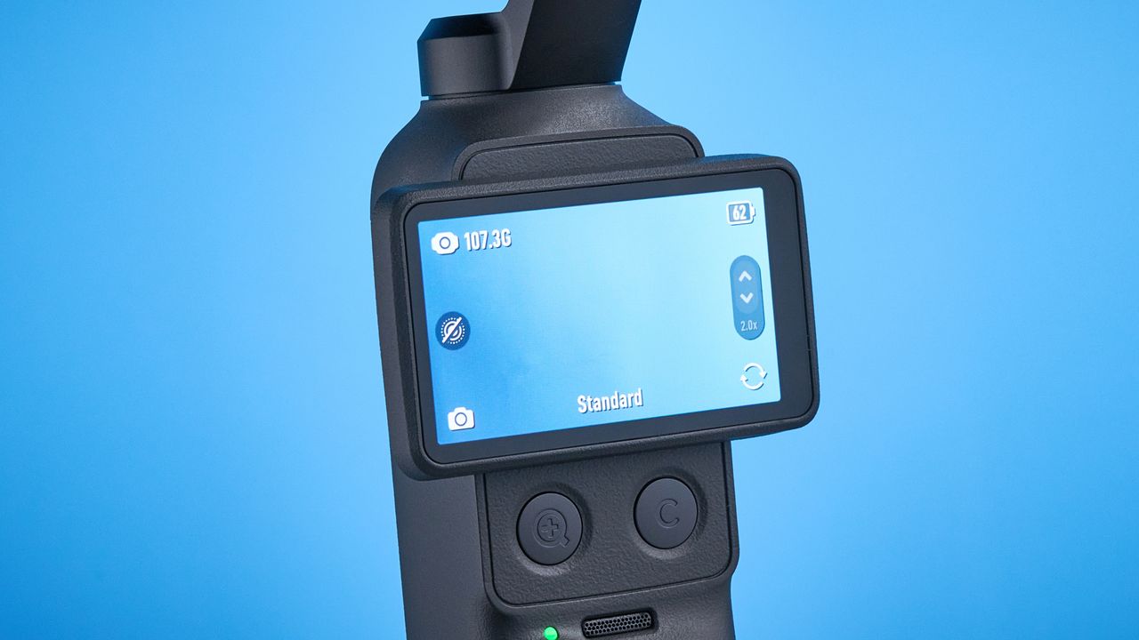 DJI Osmo Pocket 4 against a blue background