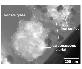 A CT scan shows carbonaceous material found in the melt splash from Ryugu.
