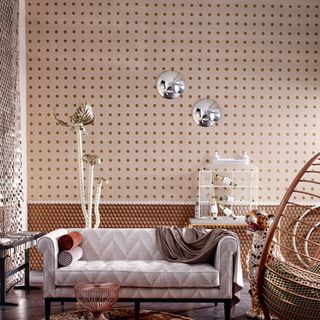 living room with dotted printed pattern on wall