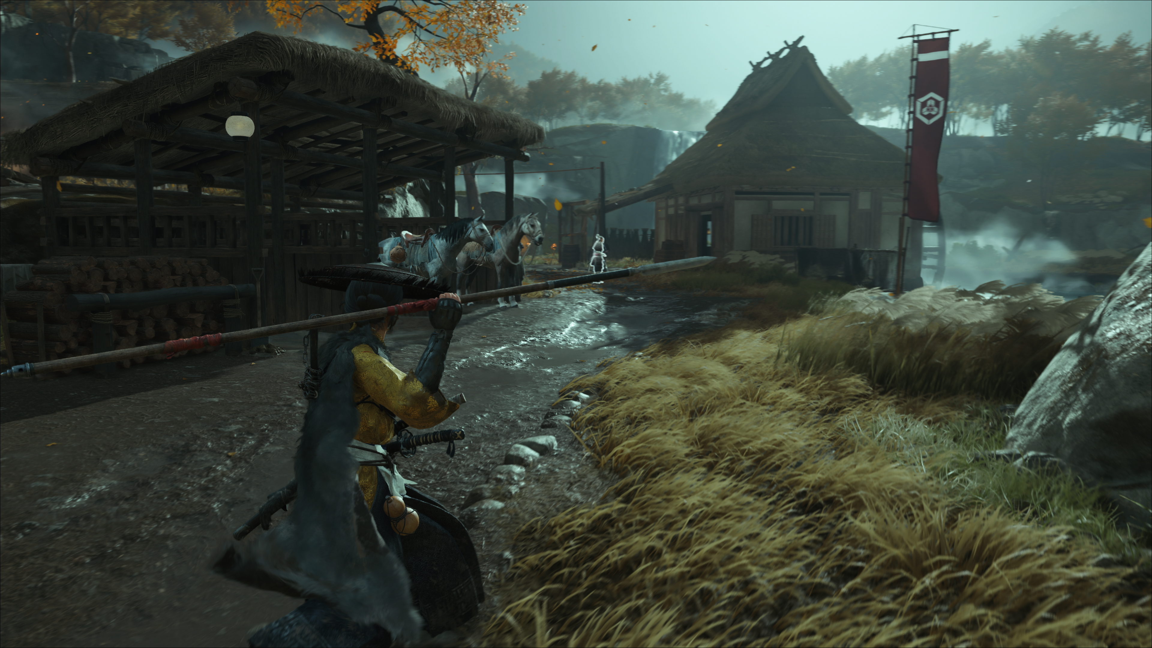 Protagonist Atsu entering a dimly-lit village while holding a spear in Ghost of Yotei