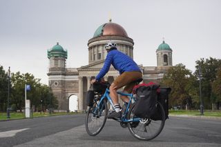 Image shows Stefan riding towards Esztergom Basilica in Hungary