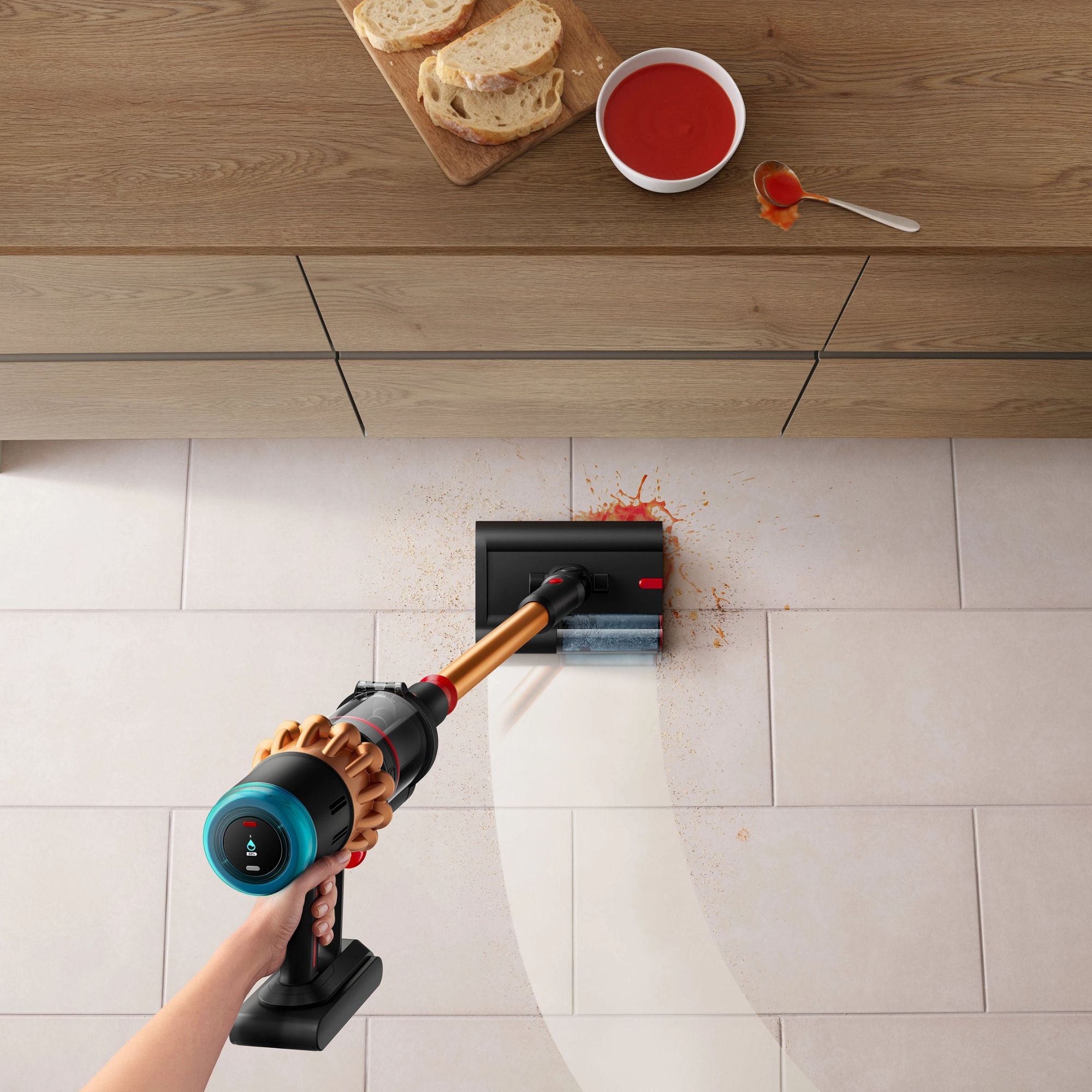 Dyson V16 Piston Animal Submarine cleaning tomato soup from white tiled floor