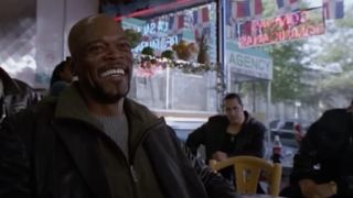 Samuel L. Jackson laughing in a coffeeshop in Shaft