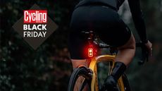 The Magicshine Seemeee 300 rear bike light fitted on a bike with the Cycling Weekly Black Friday deals logo