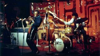 American trumpeter and composer Miles Davis (1926 - 1991) performs on stage with pianist Chick Corea, bassist Dave Holland and drummer Jack Dejohnette for the BBC 'Jazz Scene' television show filmed at Ronnie Scott's Jazz Club in Soho, London on 2nd November 1969. 