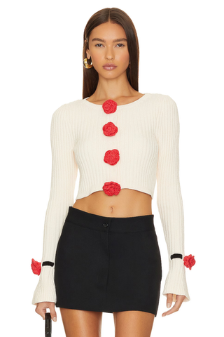 short white cardigan with rose shaped buttons