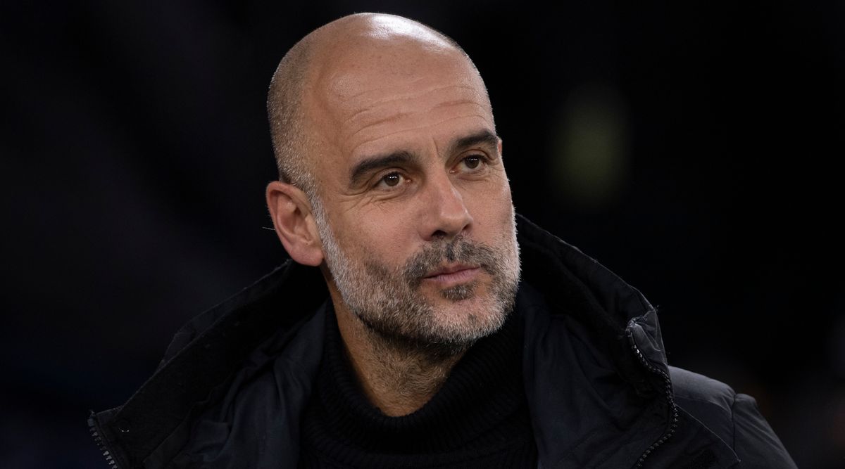 Manchester City manager Pep Guardiola looks on during the FA Cup quarter-final match between Manchester City and Burnley at the Etihad Stadium on March 18, 2023 in Manchester, United Kingdom.