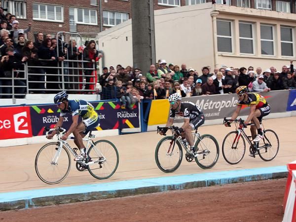 Bjorn Leukemans (Vacansoleil Pro Cycling Team), Roger Hammond (Cervelo TestTeam), and Tom Boonen (Quick Step) size each other up before the final lap on the velodrome.