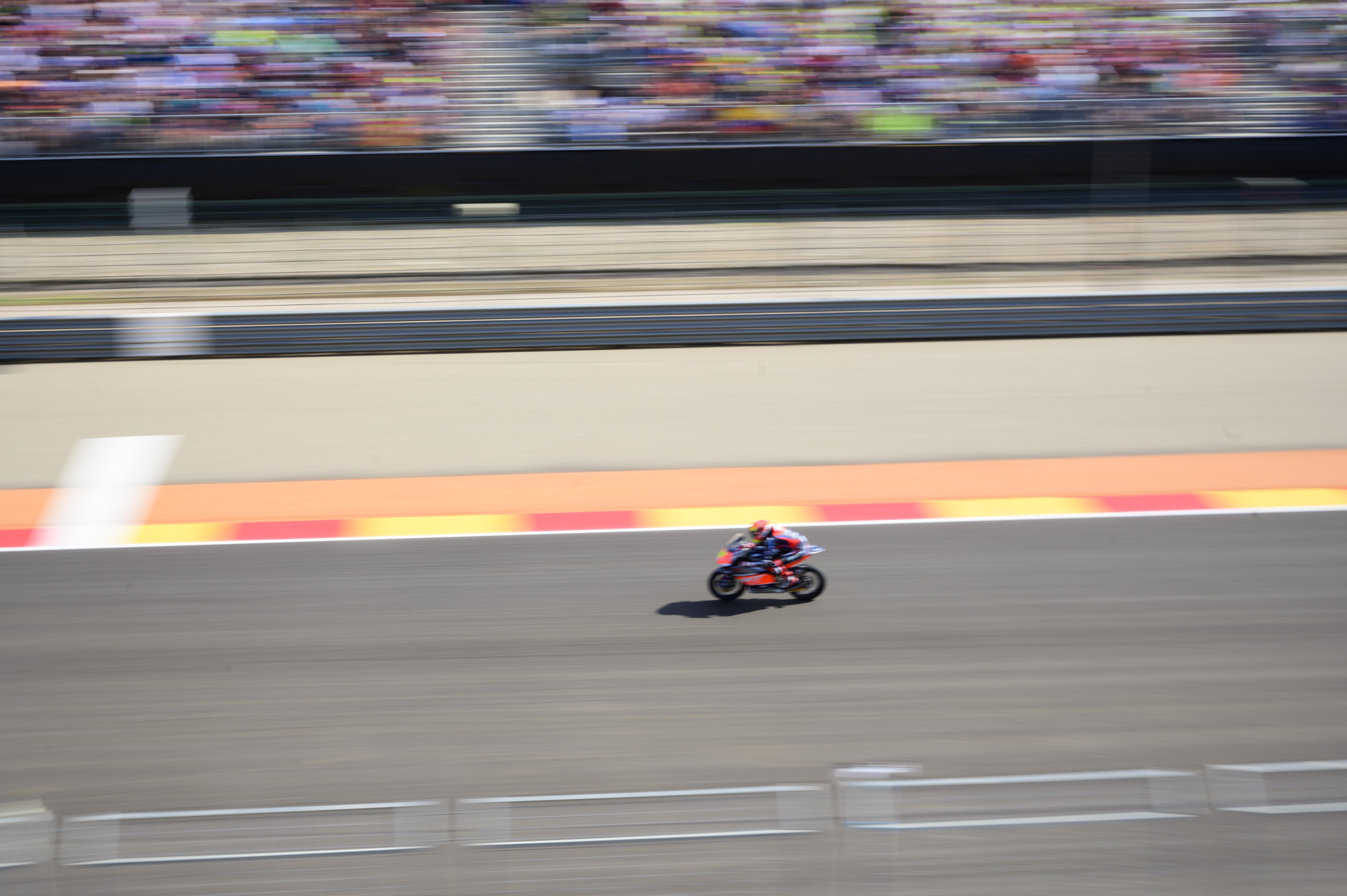 MotoGP racetrack with motorbike riders at full speed