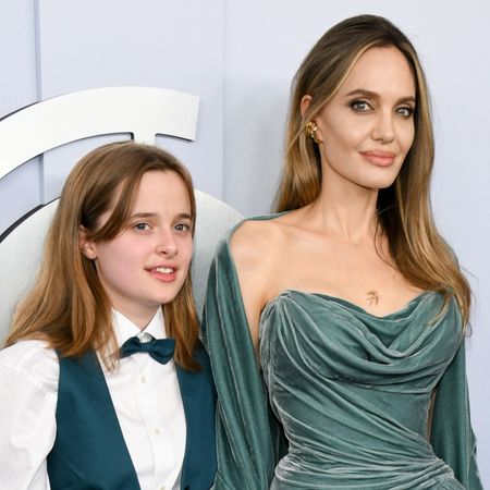 Angelina Jolie wearing a velvet corset dress with her daughter at the tony awards