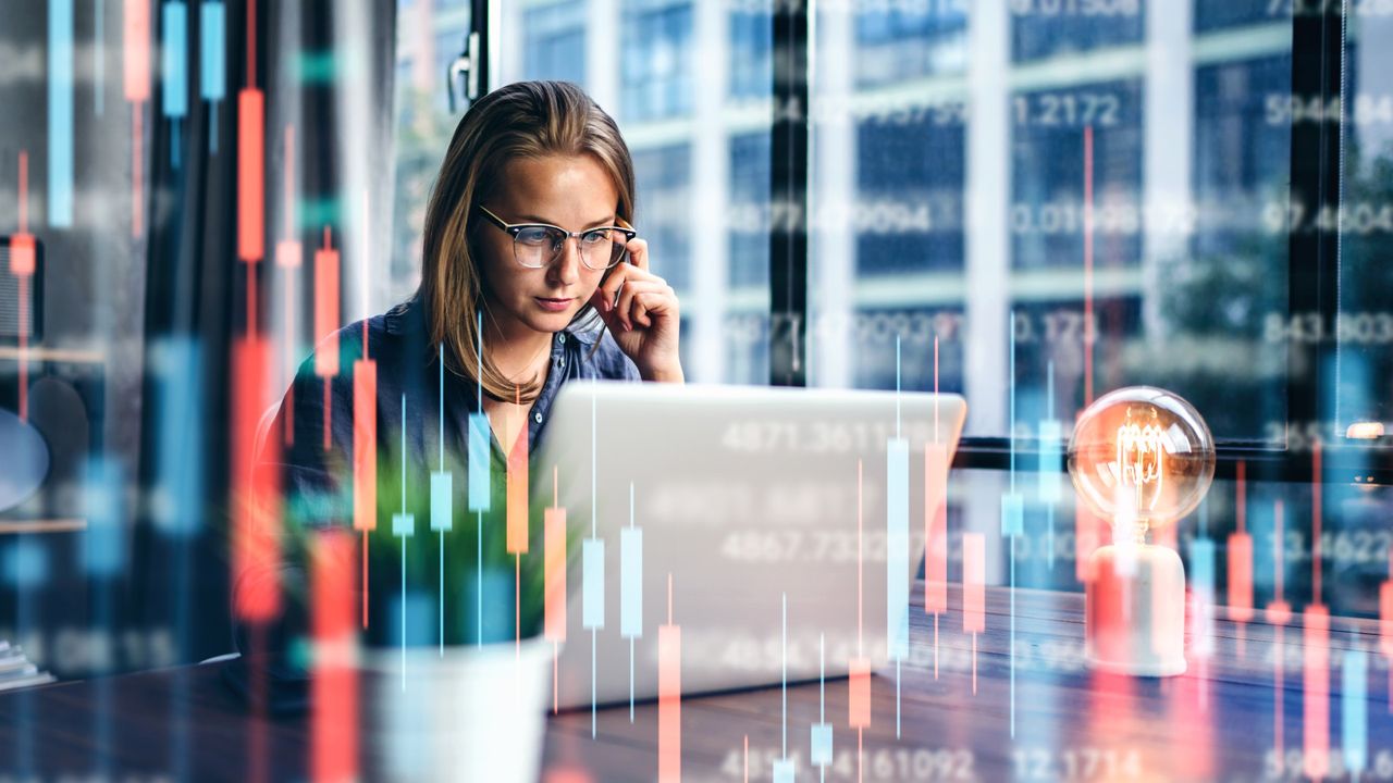 A young woman reviews her finances.