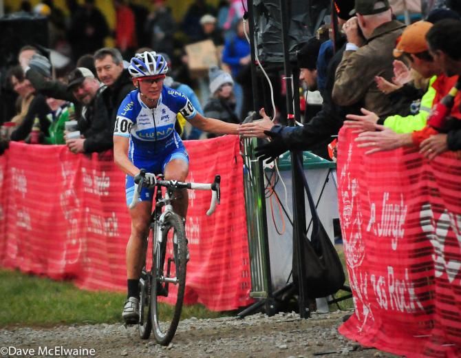 Katerina Nash (Luna Pro Team) celebrates with the crowd at the Johnson County Fairgounds