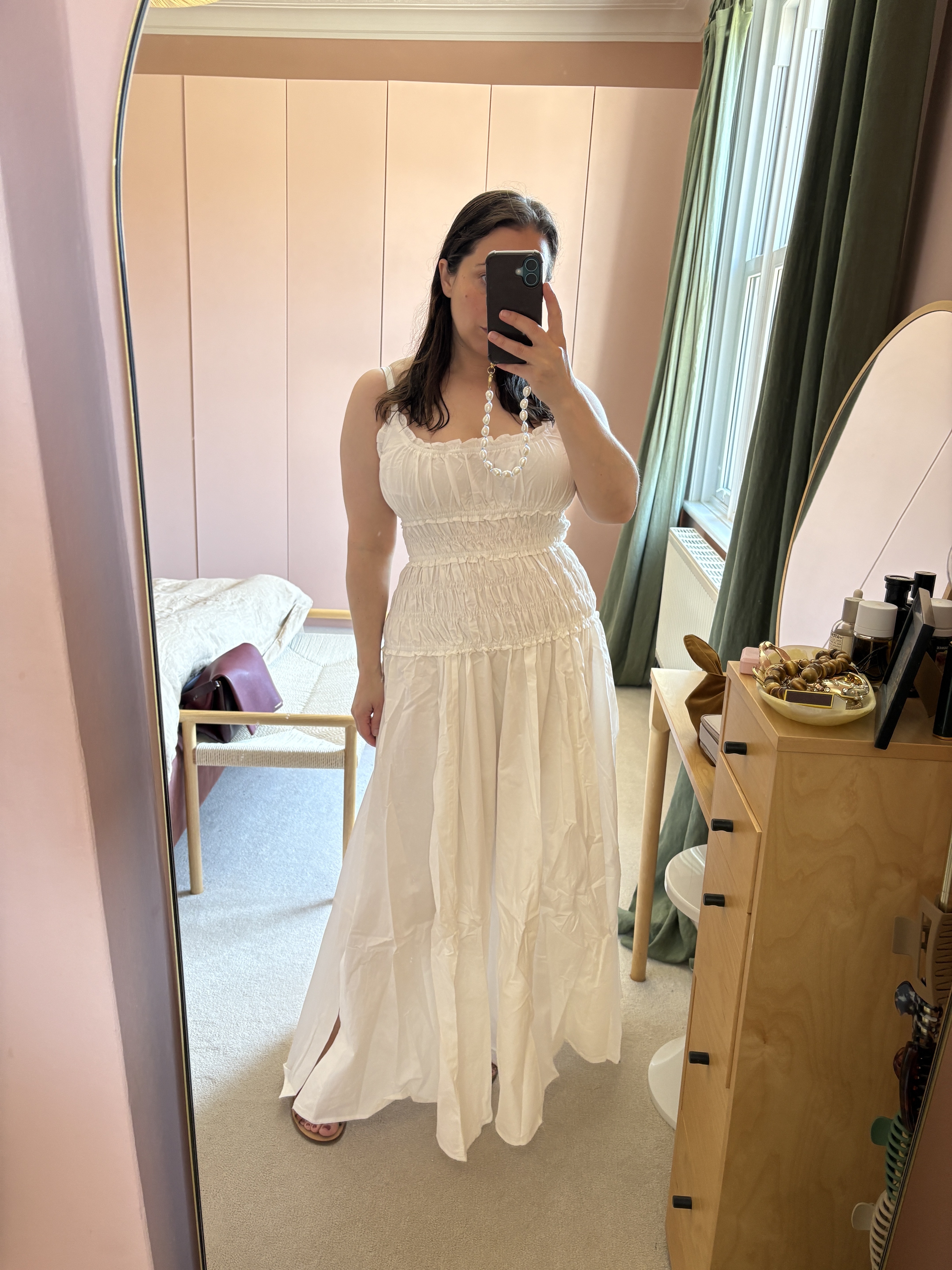 An image of Who What Wear UK's Hannah Almassi wearing one of the best DISSH dresses.