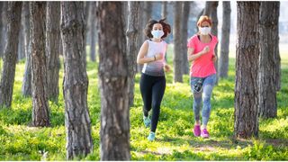 Women running with masks
