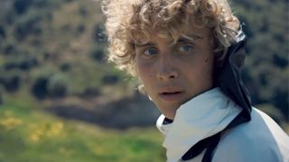 Haymitch looks over his shoulder