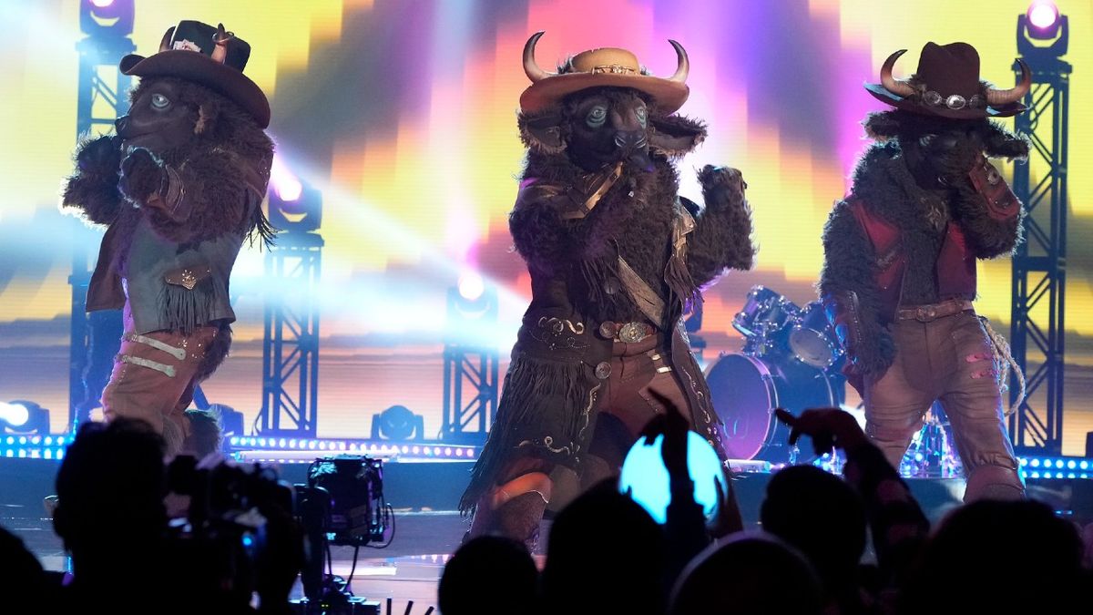 The Buffalos performing onstage during The Masked Singer finale. 