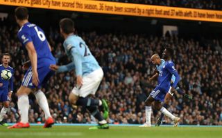 Vincent Kompany scores one of the goals of the season to secure a vital 1-0 win against Leicester in City's penultimate game