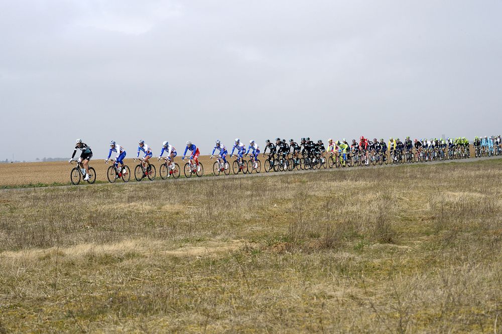 The pack rides during the first stage of the 73rd edition of the Paris-Nice.