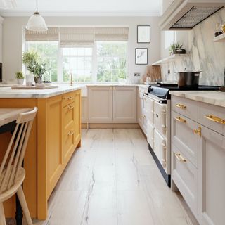 White kitchen with yellow island