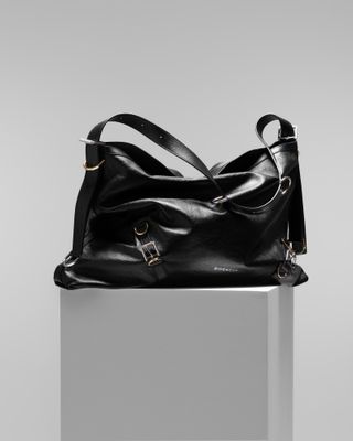 Givenchy Voyou bag photographed on plinth