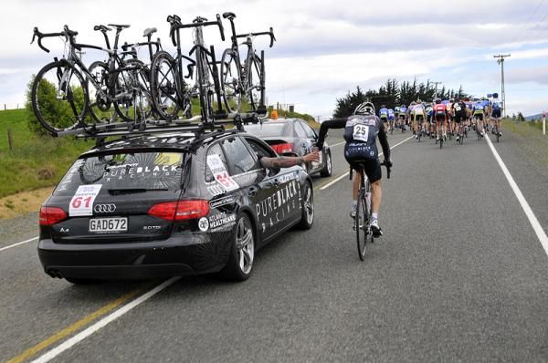 Daniel Barry (Pure Black Racing) heads back to the team car for food for the team