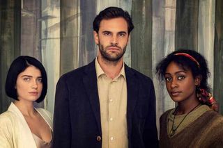 Adele (Eve Hewson), her husband David (Tom Bateman) and Louise (Simona Brown) in "Behind Her Eyes" on Netflix.