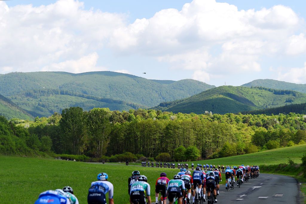 KAZINCBARCIKA HUNGARY MAY 14 A general view of the peloton passing through a landscape during the 43rd Tour de Hongrie 2022 Stage 4 a 177km stage from Kazincbarcika to Kazincbarcika tourdehongrie on May 14 2022 in Kazincbarcika Hungary Photo by Dario BelingheriGetty Images