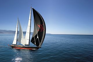 Sailing superyacht Marie on the water with a full sail