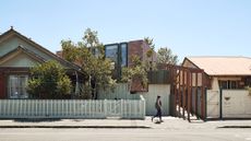 Streetview of the Scarborough and Welkin project, suburban house against blue skies