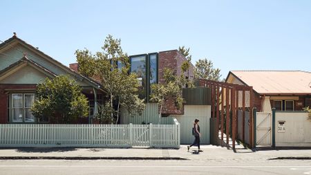 Streetview of the Scarborough and Welkin project, suburban house against blue skies